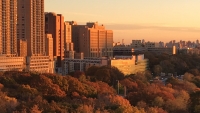 The NYSPI building at sunset taken from across the Hudson River